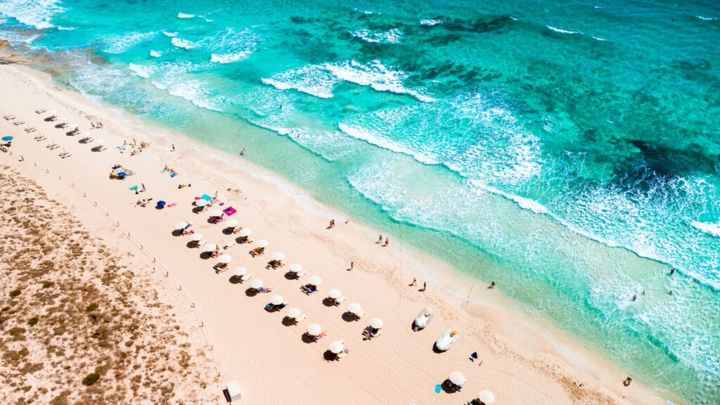 a beach with many people